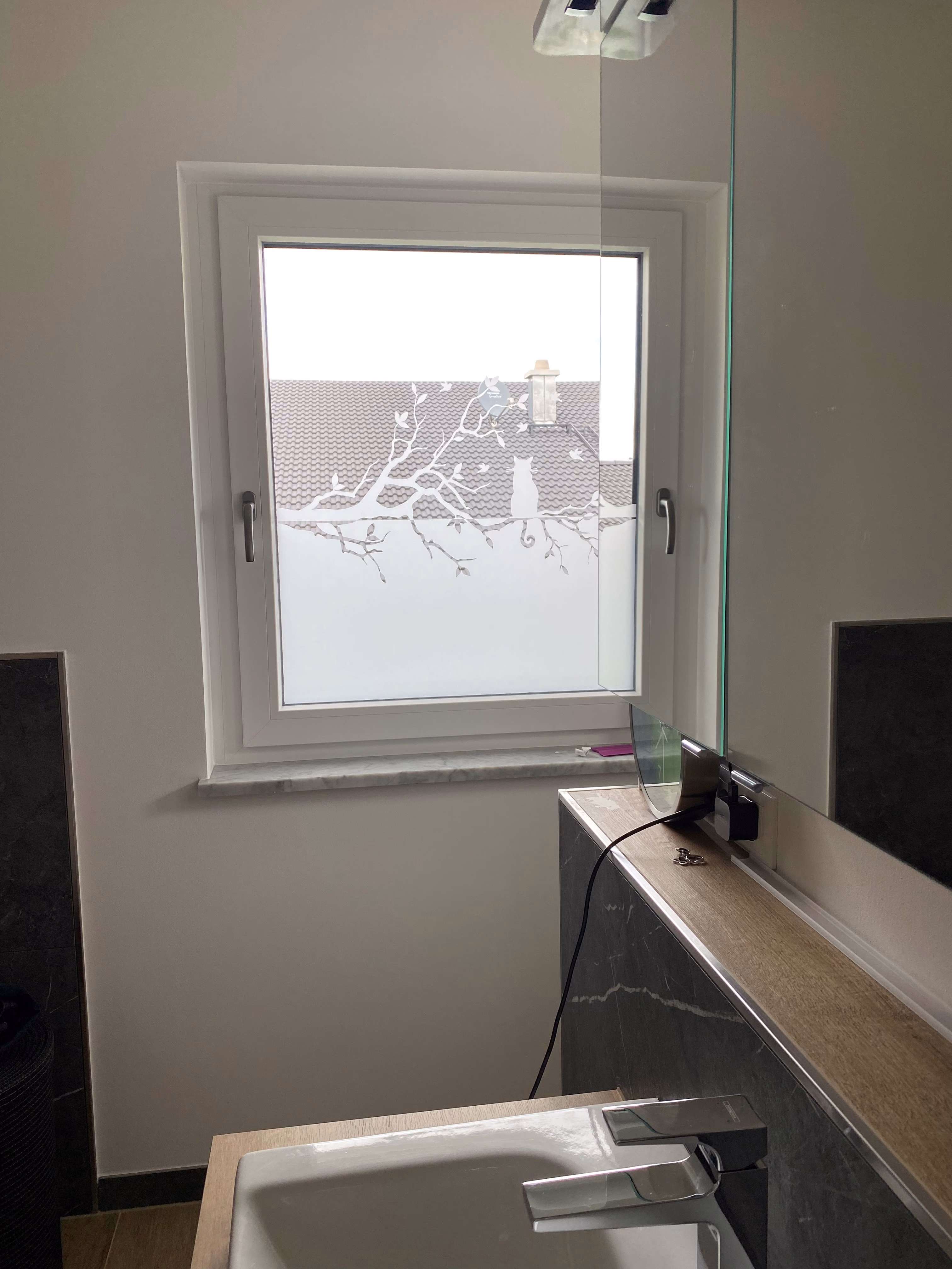 Glasdekor für Fensterscheiben mit einer Katze